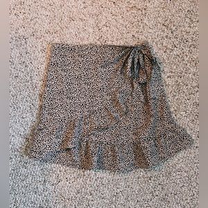 Spotted wrap mini skirt